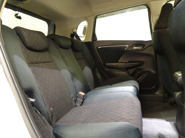 フィット 13G・Fパッケージ 禁煙 純正ナビTV ドラレコ前後 ETC リアカメラ Bluetooth VSA スマートキー 社外AW マニュアルエアコン 電動格納式ドアミラー ブルートゥース AUX対応 イモビ 安全ボディ PS(12枚目)