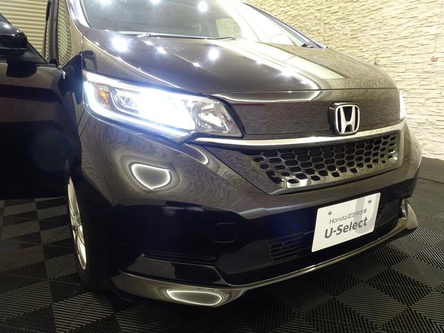 フリード Ｇ・ホンダセンシング　禁煙　純正９ｉｎｃｈナビＴＶ　純正ドラレコ前後　ＥＴＣ　ＬＥＤ　リアカメラ　Ｂｌｕｅｔｏｏｔｈ　衝突軽減Ｂ　ＶＳＡ　両側パワスラ　シートヒーター　クルーズコントロール　スマートキー　社外ＡＷ　１オナ（7枚目）