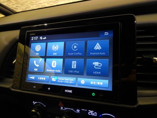 フィット ｅ：ＨＥＶホーム　ブラックスタイル　元デモカー　禁煙　純正ディスプレイオーディオ　リアカメラ　Ｂｌｕｅｔｏｏｔｈ　衝突軽減Ｂ　ＶＳＡ　サイドエアバッグ　パーキングセンサー　クルーズコントロール　スマートキー　オートＡＣ　純正ＡＷ（2枚目）