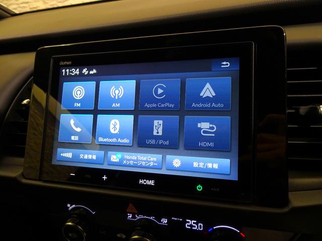 フィット ｅ：ＨＥＶホーム　ブラックスタイル　元デモカー　禁煙　純正ディスプレイオーディオリアカメラ　Ｂｌｕｅｔｏｏｔｈ　衝突軽減Ｂ　ＶＳＡ　サイドエアバッグ　パーキングセンサー　クルーズコントロール　スマートキー　純正ＡＷ　オートＡＣ（2枚目）