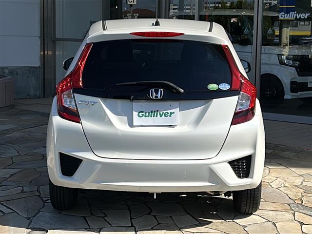 フィット 13G・Fパッケージ 社外ナビ・Bluetooth・CD・AUX・AM・FM・バックカメラ・横滑り防止装置・ステアリングリモコン・純正フロアマット・純正ホイールキャップ・プッシュスタート・スマートキー・アイドリングストップ(31枚目)