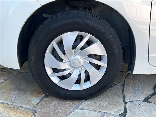 フィット 13G・Fパッケージ 社外ナビ・Bluetooth・CD・AUX・AM・FM・バックカメラ・横滑り防止装置・ステアリングリモコン・純正フロアマット・純正ホイールキャップ・プッシュスタート・スマートキー・アイドリングストップ(38枚目)