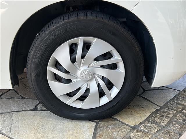 フィット 13G・Fパッケージ 社外ナビ・Bluetooth・CD・AUX・AM・FM・バックカメラ・横滑り防止装置・ステアリングリモコン・純正フロアマット・純正ホイールキャップ・プッシュスタート・スマートキー・アイドリングストップ(39枚目)