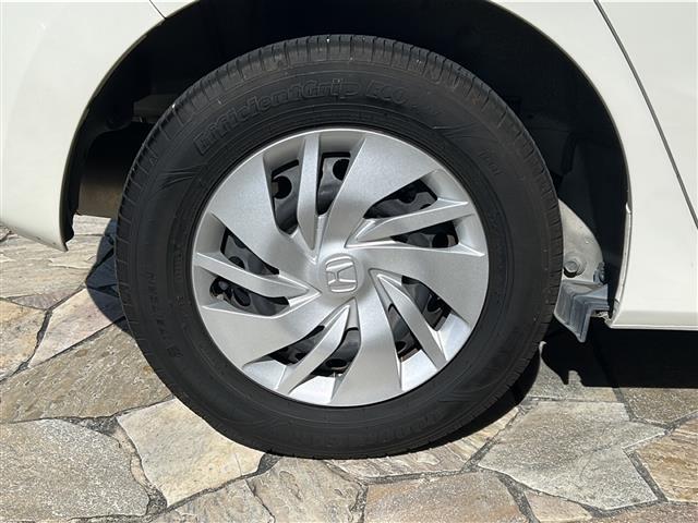 フィット 13G・Fパッケージ 社外ナビ・Bluetooth・CD・AUX・AM・FM・バックカメラ・横滑り防止装置・ステアリングリモコン・純正フロアマット・純正ホイールキャップ・プッシュスタート・スマートキー・アイドリングストップ(40枚目)