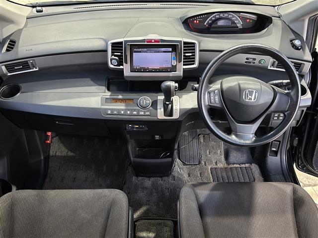 フリード G ジャストセレクション 純正メモリナビ・DVD・CD・AM・FM・Bluetooth・ワンセグTV・バックカメラ・ステアリングリモコン・ドライブレコーダー前・横滑り防止・社外フロアマット・純正ホイールキャップ・両側パワスラ(42枚目)