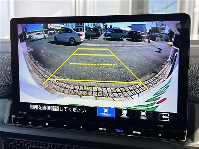 ステップワゴン e:HEVエアー EX 純正ナビ バックカメラ 2列目オットマン 後席フリップダウンモニター クリアランスソナー ブラインドスポット パワーテールゲート 後席エアコン シートヒーター 全列USB 純正16インチアルミ(3枚目)