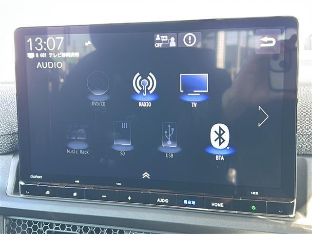 ステップワゴン e:HEVエアー EX 純正ナビ バックカメラ 2列目オットマン 後席フリップダウンモニター クリアランスソナー ブラインドスポット パワーテールゲート 後席エアコン シートヒーター 全列USB 純正16インチアルミ(4枚目)