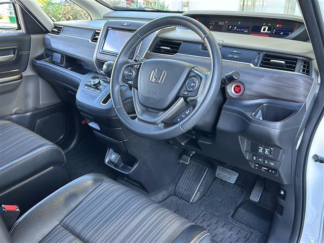 フリード Ｇ・ホンダセンシング　純正ナビ　レーダークルーズコントロール　ドライブレコーダー　バックカメラ　両側パワースライドドア　ホンダセンシング　ＥＴＣ　ステアリングリモコン　ハーフレザーシート　レーンキープアシスト　オートライト（18枚目）