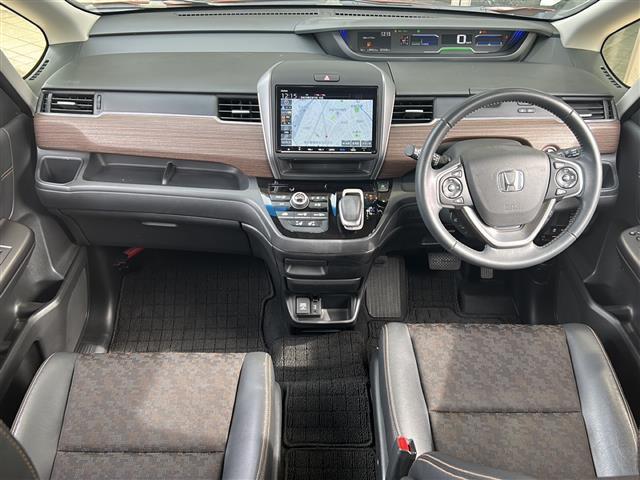 フリードハイブリッド ハイブリッド・クロスターホンダセンシング 純正ナビ ドライブレコーダー シートヒーター レーダークルーズコントロール スマートキー 両側パワースライドドア ETC バックカメラ ステアリングリモコン レーンキープ プッシュスタート 純正アルミ(42枚目)