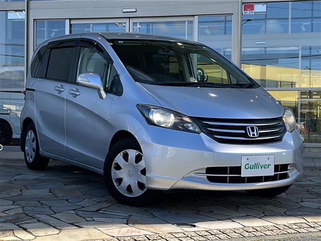 フリード G ジャストセレクション 社外ナビ(AM FM CD ワンセグテレビ iPod) 片側パワースライドドア チップアップシート 3列シート ETC 純正フロアマット キノセンヘッドライト オートライト リモコンキー スペアキー(2枚目)