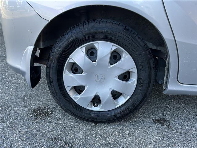 フリード G ジャストセレクション 社外ナビ(AM FM CD ワンセグテレビ iPod) 片側パワースライドドア チップアップシート 3列シート ETC 純正フロアマット キノセンヘッドライト オートライト リモコンキー スペアキー(39枚目)