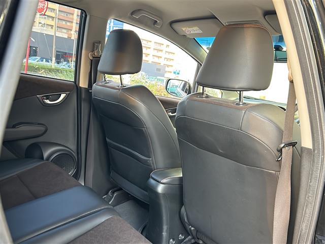 フィットシャトルハイブリッド ハイブリッド・スマートセレクション　純正ナビ　バックカメラ　ビルトインＥＴＣ　１５インチ純正アルミ　横滑り防止装置　ヒルスタートアシスト　オートエアコン　フォグランプ　オートライト　パドルシフト　ステアリングリモコン　ＨＩＤライト（21枚目）