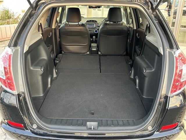 フィットシャトルハイブリッド ハイブリッド・スマートセレクション　純正ナビ　バックカメラ　ビルトインＥＴＣ　１５インチ純正アルミ　横滑り防止装置　ヒルスタートアシスト　オートエアコン　フォグランプ　オートライト　パドルシフト　ステアリングリモコン　ＨＩＤライト（28枚目）