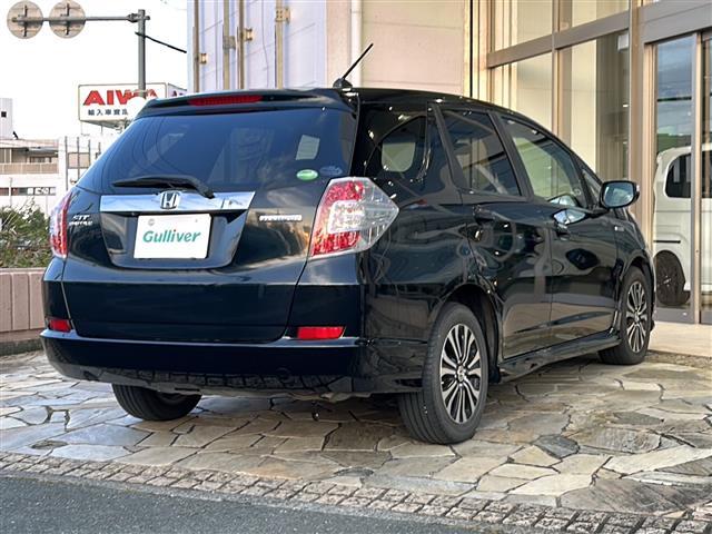 フィットシャトルハイブリッド ハイブリッド・スマートセレクション　純正ナビ　バックカメラ　ビルトインＥＴＣ　１５インチ純正アルミ　横滑り防止装置　ヒルスタートアシスト　オートエアコン　フォグランプ　オートライト　パドルシフト　ステアリングリモコン　ＨＩＤライト（34枚目）