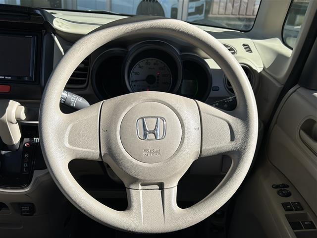 Ｎ－ＢＯＸ Ｇ　イクリプスナビ　ワンセグ　ＣＤ　ＥＴＣ　横滑り防止装置　プッシュスタート　オートエアコン　ハロゲンライト　純正ホイールキャップ　純正フロアマット　マニュアルレベリング　パワーウィンドウ（運転席オート）（5枚目）