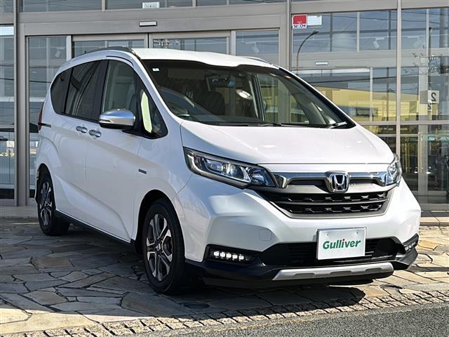 フリード+ハイブリッド ハイブリッド・クロスターホンダセンシング 純正ナビ バックカメラ フリップダウンモニター ホンダセンシング ハーフレザーシート シートヒーター LEDヘッドライト ETC サイドカーテンエアバッグ ルーフレール オートライト 純正アルミ(29枚目)