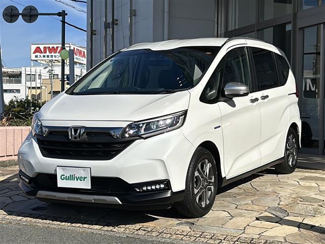 フリード+ハイブリッド ハイブリッド・クロスターホンダセンシング 純正ナビ バックカメラ フリップダウンモニター ホンダセンシング ハーフレザーシート シートヒーター LEDヘッドライト ETC サイドカーテンエアバッグ ルーフレール オートライト 純正アルミ(31枚目)