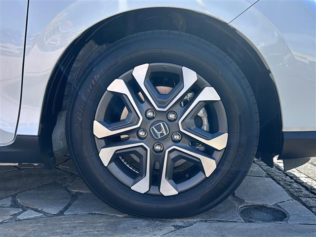 フリード+ハイブリッド ハイブリッド・クロスターホンダセンシング 純正ナビ バックカメラ フリップダウンモニター ホンダセンシング ハーフレザーシート シートヒーター LEDヘッドライト ETC サイドカーテンエアバッグ ルーフレール オートライト 純正アルミ(38枚目)