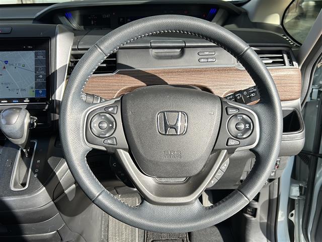 フリード クロスター　純正ナビ（ＣＤ　ＤＶＤ　ＡＭ　ＦＭ　フルセグＴＶ　ＳＤ　Ｂｌｕｅｔｏｏｔｈ）バックカメラ☆クルーズコントロール追従あり　両側パワースライドドア　シートヒーター　ドライブレコーダー　ウォークスルー（22枚目）