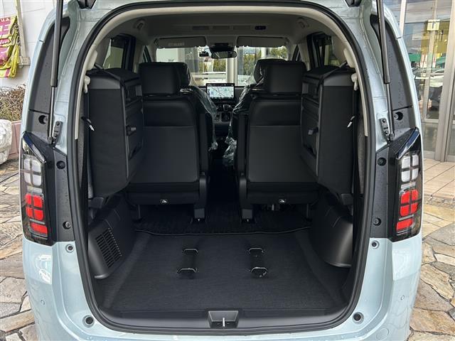 フリード ｅ：ＨＥＶエアー　ＥＸ　純正ナビ　レーダークルーズコントロール　ドライブレコーダー　両側パワースライドドア　ステアリングリモコン　ＥＴＣ　ＢＳＭ　レーンキープアシスト　コーナーセンサー　アラウンドビューモニター　ホールド（30枚目）