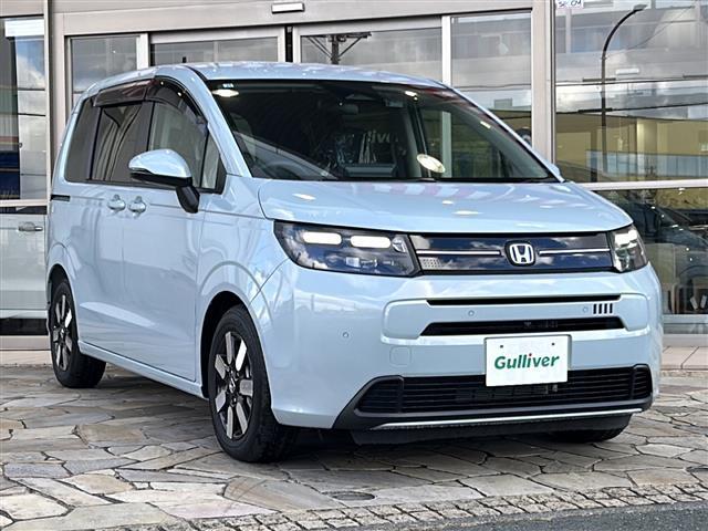 フリード ｅ：ＨＥＶエアー　ＥＸ　純正ナビ　レーダークルーズコントロール　ドライブレコーダー　両側パワースライドドア　ステアリングリモコン　ＥＴＣ　ＢＳＭ　レーンキープアシスト　コーナーセンサー　アラウンドビューモニター　ホールド（31枚目）