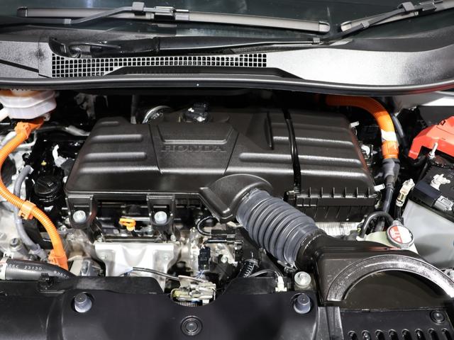 ステップワゴン ｅ：ＨＥＶエアー　タイヤ４本新品に交換　禁煙車　ホンダセンシング　ＬＥＤヘッドライト　パーキングセンサーシステム　純正ナビ　バックカメラ　Ｂｌｕｅｔｏｏｔｈ接続　両側電動スライドドア　ＥＴＣ　前後誤発進抑制（17枚目）