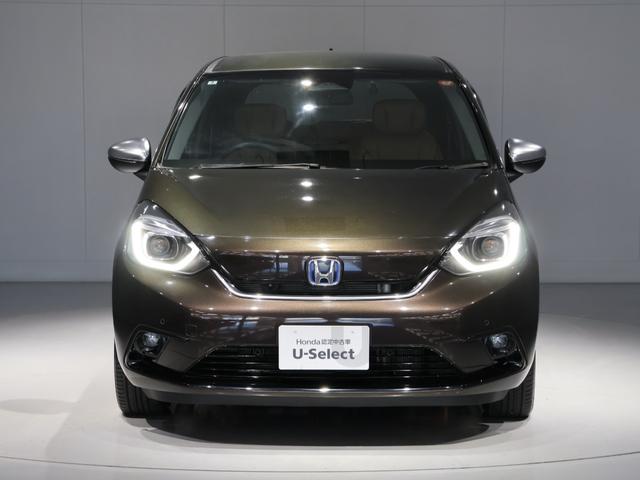 フィット e:HEVリュクス 禁煙車 運転支援機能 衝突軽減ブレーキ LEDヘッドライト 前後ドライブレコーダ先進ライト 障害物センサー 純正9インチナビ バックカメラ Bluetooth接続 ミュージックラック ETC DVD(9枚目)