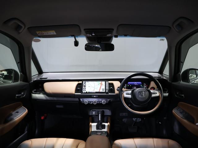 フィット e:HEVリュクス 禁煙車 運転支援機能 衝突軽減ブレーキ LEDヘッドライト 前後ドライブレコーダ先進ライト 障害物センサー 純正9インチナビ バックカメラ Bluetooth接続 ミュージックラック ETC DVD(29枚目)