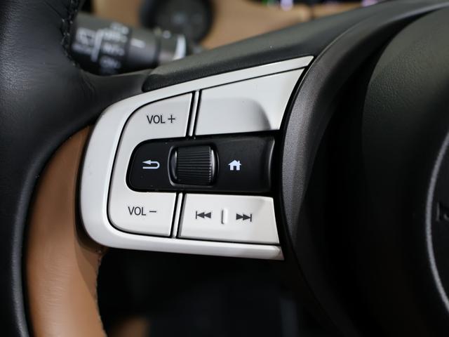 フィット e:HEVリュクス 禁煙車 運転支援機能 衝突軽減ブレーキ LEDヘッドライト 前後ドライブレコーダ先進ライト 障害物センサー 純正9インチナビ バックカメラ Bluetooth接続 ミュージックラック ETC DVD(34枚目)