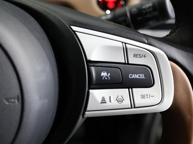 フィット e:HEVリュクス 禁煙車 運転支援機能 衝突軽減ブレーキ LEDヘッドライト 前後ドライブレコーダ先進ライト 障害物センサー 純正9インチナビ バックカメラ Bluetooth接続 ミュージックラック ETC DVD(35枚目)