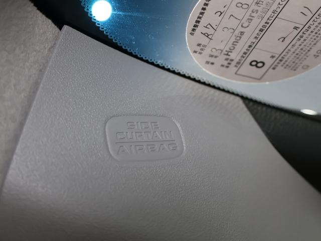 フィット e:HEVリュクス 禁煙車 運転支援機能 衝突軽減ブレーキ LEDヘッドライト 前後ドライブレコーダ先進ライト 障害物センサー 純正9インチナビ バックカメラ Bluetooth接続 ミュージックラック ETC DVD(56枚目)