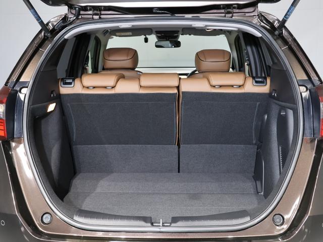 フィット e:HEVリュクス 禁煙車 運転支援機能 衝突軽減ブレーキ LEDヘッドライト 前後ドライブレコーダ先進ライト 障害物センサー 純正9インチナビ バックカメラ Bluetooth接続 ミュージックラック ETC DVD(64枚目)