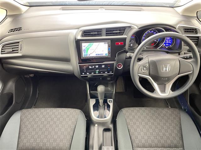 フィット １３Ｇ・Ｆパッケージ　コンフォートエディション　衝突軽減ブレーキ　純正ナビ　ＴＶ　Ｂｌｕｅｔｏｏｔｈ　バックＣ　ワイパーデアイサー　ＥＴＣ　シートヒーター　１５ＡＷ　コーナーセンサー　ヒーター付電格ミラー　スマートキー　純正マット　ＡＡＣ（26枚目）