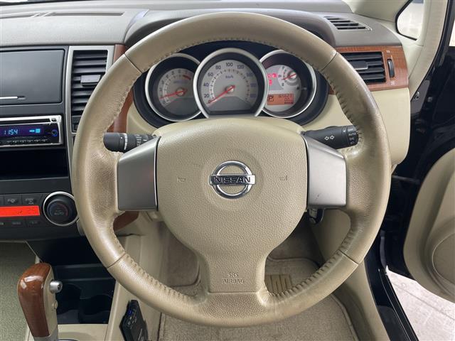 ティーダラティオ １５Ｍ　ＦＯＵＲ　４ＷＤ・社外オーディオ・ＣＤ／ＡＵＸ・オートライト・ＥＴＣ・ヘッドライトレベライザー・オートエアコン・積込夏タイヤスチールホイールセット・電動格納ミラー・ドアバイザー・スマートキー・スペアキー（10枚目）