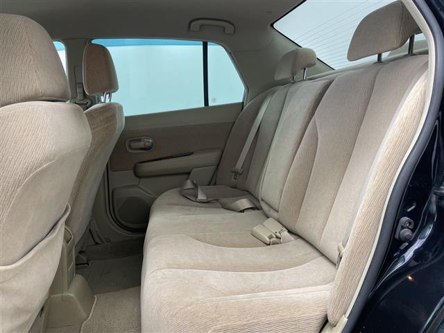 ティーダラティオ １５Ｍ　ＦＯＵＲ　４ＷＤ・社外オーディオ・ＣＤ／ＡＵＸ・オートライト・ＥＴＣ・ヘッドライトレベライザー・オートエアコン・積込夏タイヤスチールホイールセット・電動格納ミラー・ドアバイザー・スマートキー・スペアキー（18枚目）