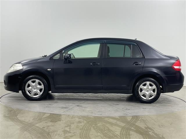 ティーダラティオ １５Ｍ　ＦＯＵＲ　４ＷＤ・社外オーディオ・ＣＤ／ＡＵＸ・オートライト・ＥＴＣ・ヘッドライトレベライザー・オートエアコン・積込夏タイヤスチールホイールセット・電動格納ミラー・ドアバイザー・スマートキー・スペアキー（27枚目）