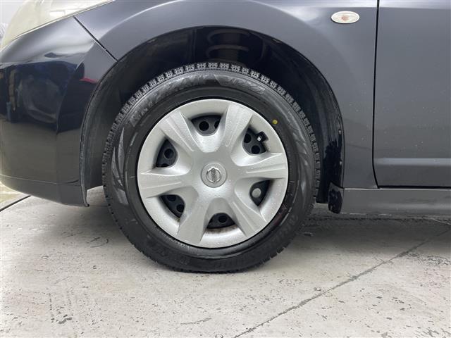 ティーダラティオ １５Ｍ　ＦＯＵＲ　４ＷＤ・社外オーディオ・ＣＤ／ＡＵＸ・オートライト・ＥＴＣ・ヘッドライトレベライザー・オートエアコン・積込夏タイヤスチールホイールセット・電動格納ミラー・ドアバイザー・スマートキー・スペアキー（32枚目）