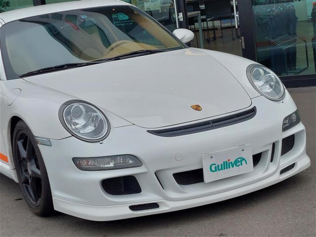 ９１１カレラ　ディーラー車　左ハンドル☆ベージュ本革シート　アルカンターラルーフライトニング　社外ナビ　フルセグＴＶ　ＭＡＲＶＩＮ　ＧＴ３　ＣＵＰタイプエアロキット　フロントスポイラー／バンパー　ドライブレコーダー(25枚目)