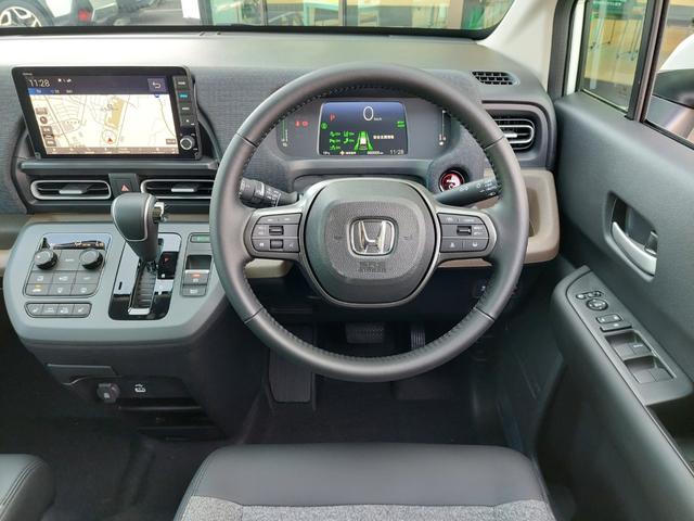 フリード e:HEVエアー EX 登録済未使用車 純正9型ナビ 後方カメラ アダクティブクルーズコントロール 両側電動スライドドア ハーフレザーシート シートヒーター リアクーラー LEDヘッドライト スマートキー 純正アルミホイール(12枚目)