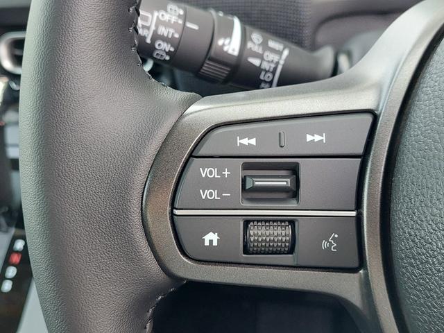 フリード e:HEVエアー EX 登録済未使用車 純正9型ナビ 後方カメラ アダクティブクルーズコントロール 両側電動スライドドア ハーフレザーシート シートヒーター リアクーラー LEDヘッドライト スマートキー 純正アルミホイール(14枚目)