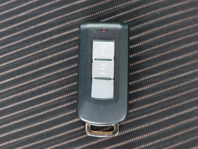 ｅＫカスタム Ｔ　純正ナビ　フルセグＴＶ　バックカメラ　ＥＴＣ　プッシュスタート　ＨＩＤヘッドライト　オートライト　ドアバイザー　電動格納ドアミラー　純正フロアマット　１５インチ純正アルミホイール　スマートキー　Ｓキー（28枚目）