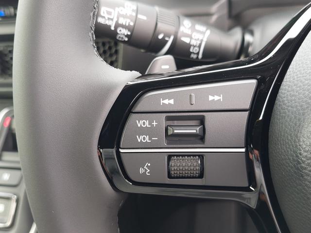 ステップワゴン e:HEVスパーダ 登録済未使用車 純正11.4型ナビ 15.6インチ後席モニター バックカメラ パドルシフト 両側パワースライドドア パワーバックドア ハーフレザーシート シートヒーター コーナーセンサー メモリナビ(7枚目)