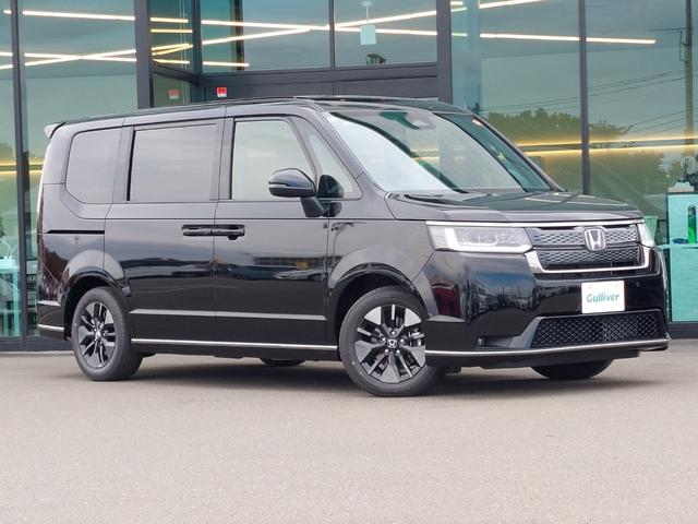 ステップワゴン e:HEVスパーダ 登録済未使用車 純正11.4型ナビ 15.6インチ後席モニター バックカメラ パドルシフト 両側パワースライドドア パワーバックドア ハーフレザーシート シートヒーター コーナーセンサー メモリナビ(68枚目)