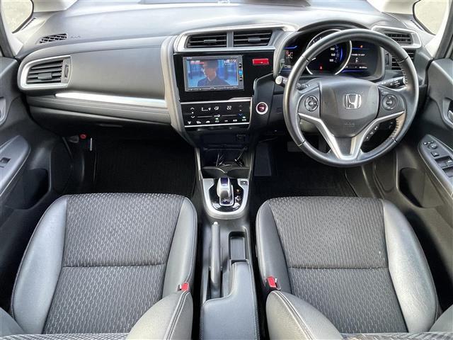 フィットハイブリッド Lパッケージ 純正ナビ バックカメラ ETC 衝突軽減 横滑り防止 クルーズコントロール ハーフレザーシート LEDヘッドライト コンフォートビューパッケージ あんしんパッケージ AUTOライト ナビ&TV LED(2枚目)