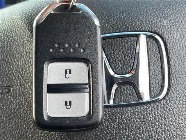 フィットハイブリッド Lパッケージ 純正ナビ バックカメラ ETC 衝突軽減 横滑り防止 クルーズコントロール ハーフレザーシート LEDヘッドライト コンフォートビューパッケージ あんしんパッケージ AUTOライト ナビ&TV LED(10枚目)