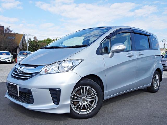 フリード X サイドリフトアップシート 禁煙車 メモリーナビ DVD ワンセグ Bカメラ BT音楽 スマートキー ETC オートエアコン ステアリモコン 左電動スライドドア HID 社外15インチAW Tチェーン(8枚目)