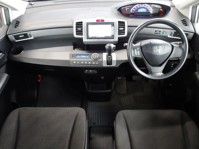 フリード X サイドリフトアップシート 禁煙車 メモリーナビ DVD ワンセグ Bカメラ BT音楽 スマートキー ETC オートエアコン ステアリモコン 左電動スライドドア HID 社外15インチAW Tチェーン(11枚目)