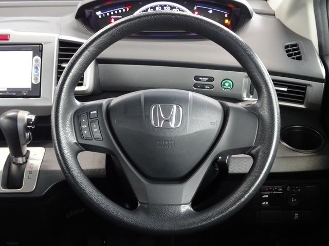 フリード X サイドリフトアップシート 禁煙車 メモリーナビ DVD ワンセグ Bカメラ BT音楽 スマートキー ETC オートエアコン ステアリモコン 左電動スライドドア HID 社外15インチAW Tチェーン(30枚目)