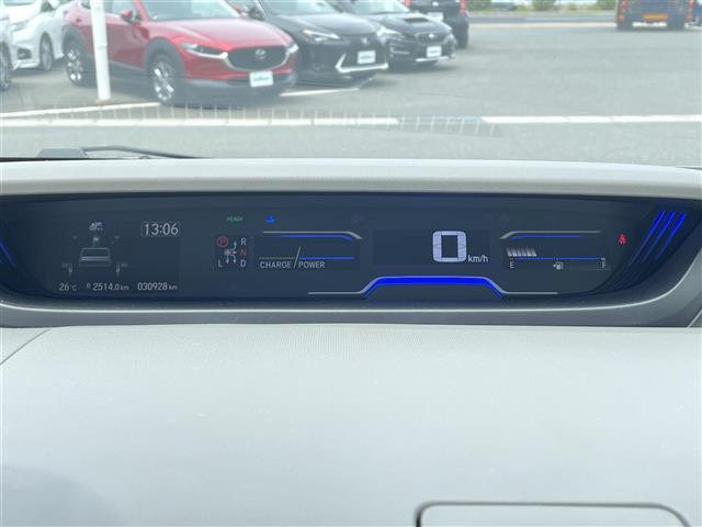 フリードハイブリッド ハイブリッド・Ｇホンダセンシング　ワンオーナー　純正９インチナビ　ＤＶＤ／ＤＴＶ／Ｂｌｕｅｔｏｏｔｈ／ＵＳＢ　バックカメラ　レーダークルーズコントロール　両側パワースライドドア　ＬＥＤオートライト　純正ホイール付きスタッドレス積込（12枚目）