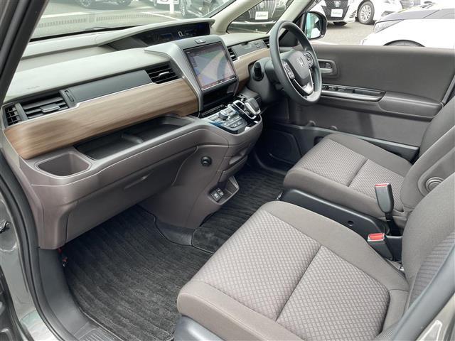 フリードハイブリッド ハイブリッド・Ｇホンダセンシング　ワンオーナー　純正９インチナビ　ＤＶＤ／ＤＴＶ／Ｂｌｕｅｔｏｏｔｈ／ＵＳＢ　バックカメラ　レーダークルーズコントロール　両側パワースライドドア　ＬＥＤオートライト　純正ホイール付きスタッドレス積込（22枚目）